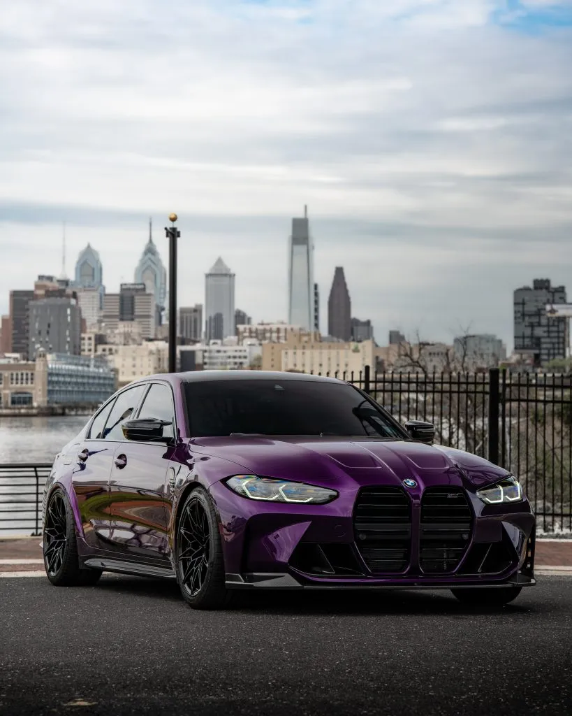 Purple G80 M3 with the Philadelphia skyline