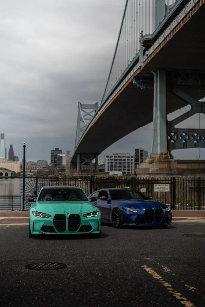 Teal G80 M3 and blue G82 M4 under the bridge