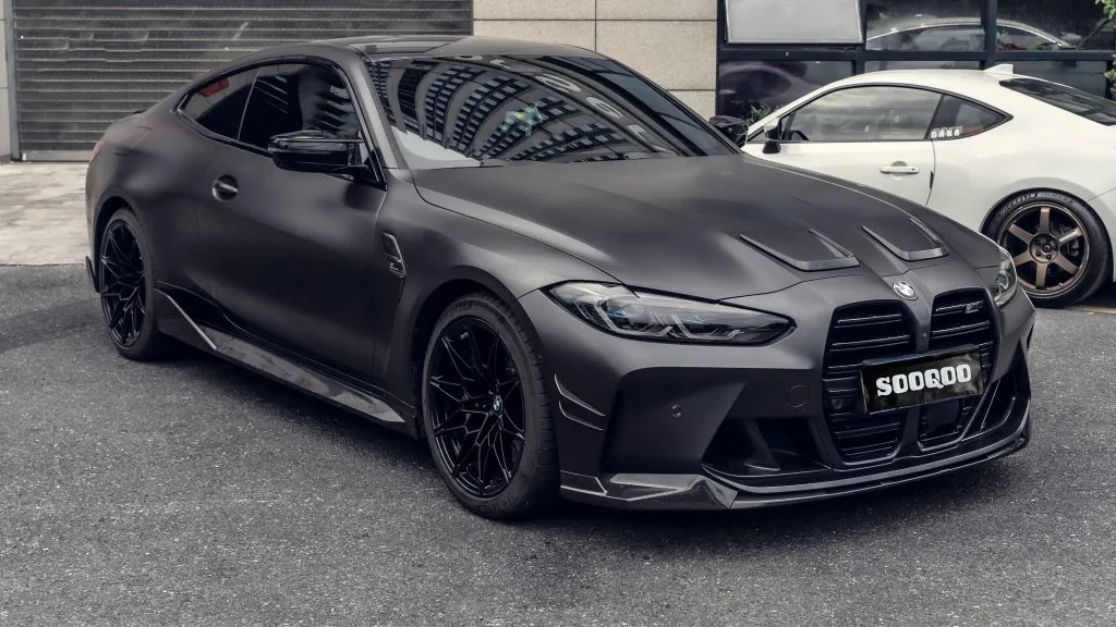 BMW G82 M4 MP style prepreg dry carbon fiber full replacement side skirts with gloss finish w/winglet — image 8 of 12