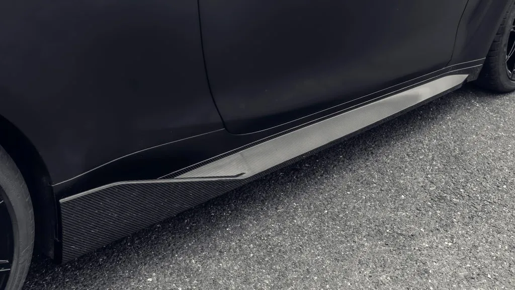 BMW G82 M4 MP style prepreg dry carbon fiber full replacement side skirts with gloss finish w/winglet — image 9 of 12