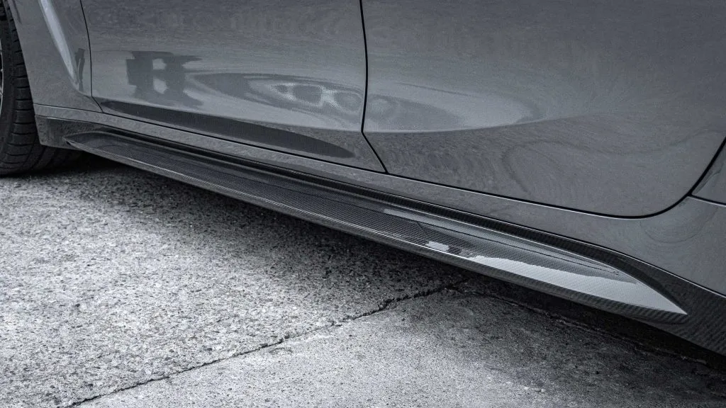 BMW G82 M4 OEM style prepreg dry carbon fiber full replacement side skirts with NO WINGLET — image 5 of 16