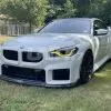 BMW G87 M2 front lip splitter in prepreg carbon fiber OEM + | SPL1 — thumbnail 1