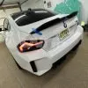 BMW G87 M2 | G42 OEM++ custom rear spoiler in prepreg dry carbon fiber with a gloss finish |UnitExclusives  - As seen on Daily Downshift — thumbnail 3