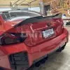 BMW G87 M2 | G42 OEM++ custom rear spoiler in prepreg dry carbon fiber with a gloss finish |UnitExclusives  - As seen on Daily Downshift — thumbnail 1