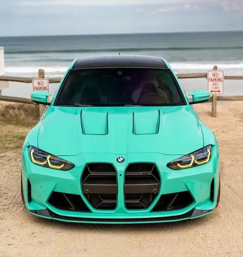 Mint green BMW G8X M3/M4 by the beach