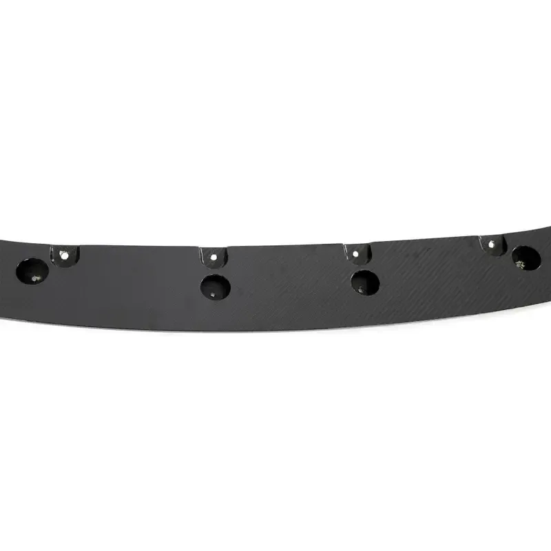 Underside of the carbon SPL2 front splitter, showing its mounting tabs and pre-drilled holes