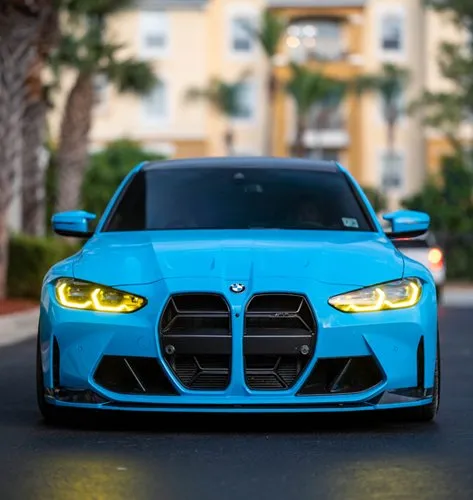 Light blue BMW G8X M3/M4 with yellow headlights