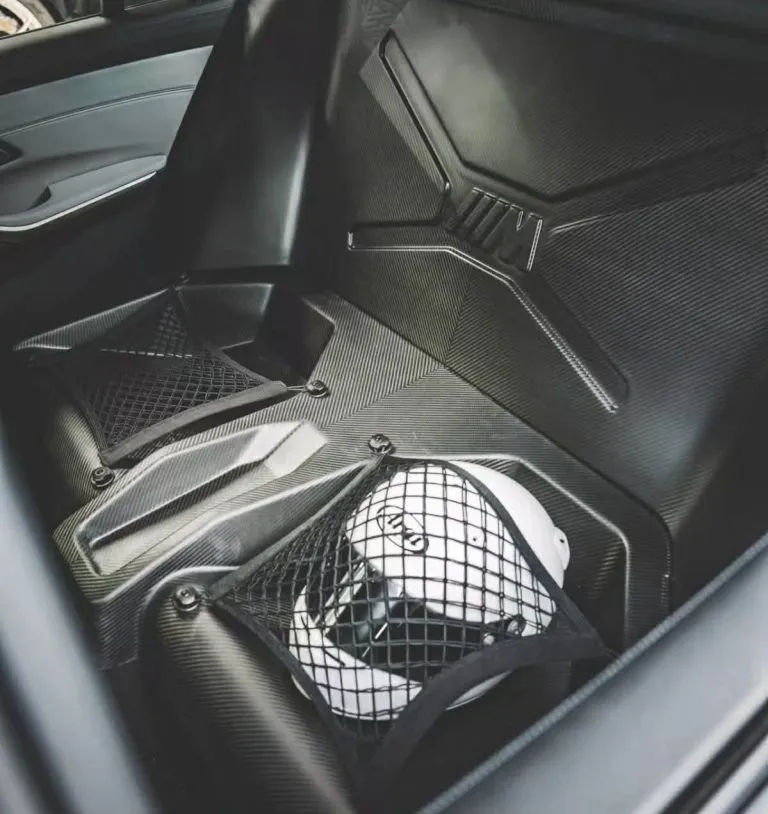 BMW G80 Rear Seat Delete in full dry carbon fiber.