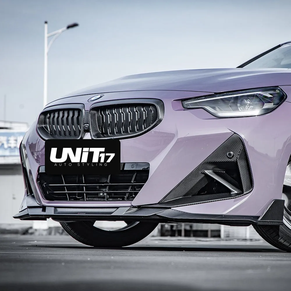 Low-angle BMW G42 front view showing a carbon Front Air Duct