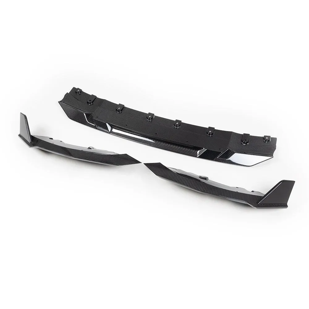 BMW G42 2 Series carbon Front Lip sections laid out on white