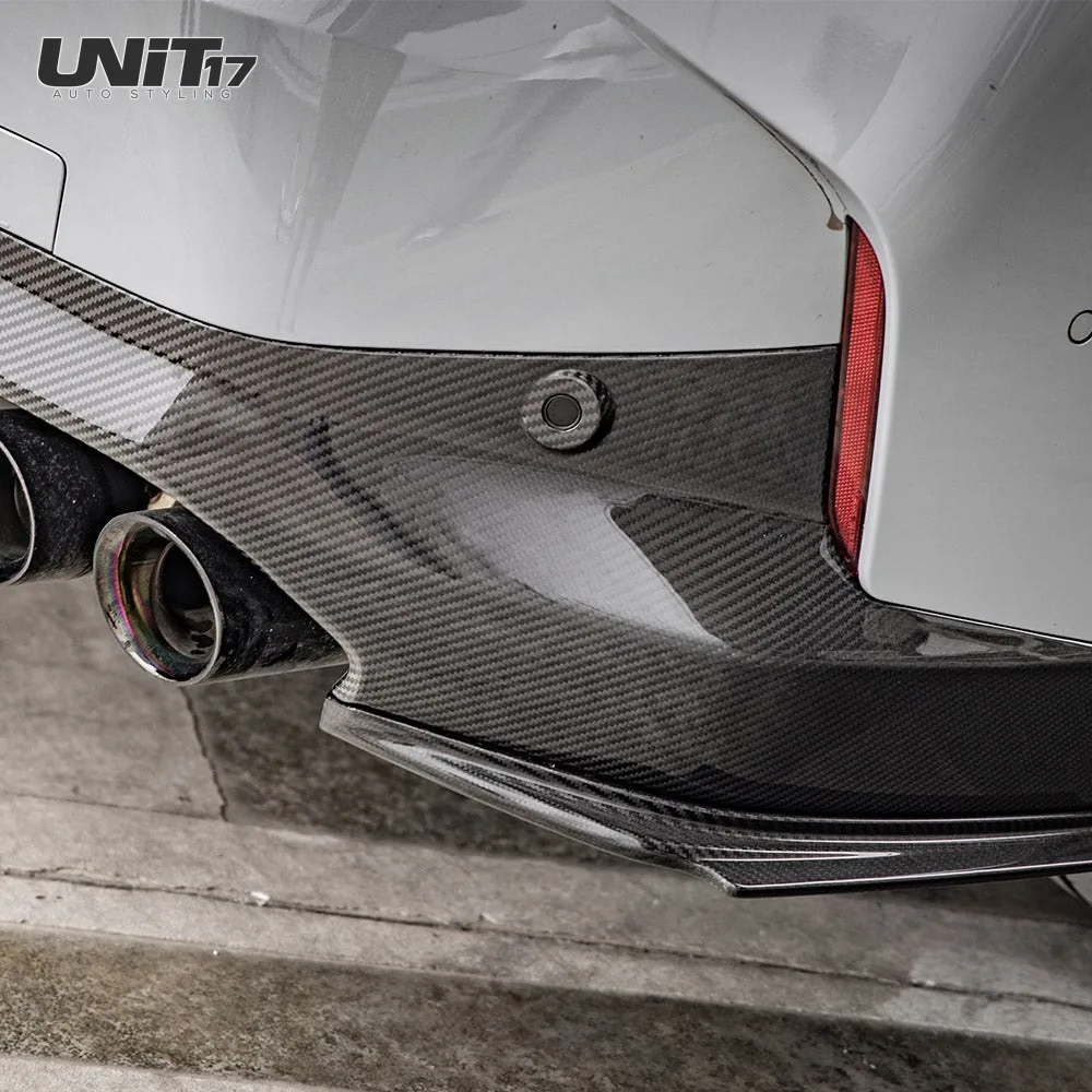 Installed G42 rear spat beneath the bumper corner beside twin exhaust tips
