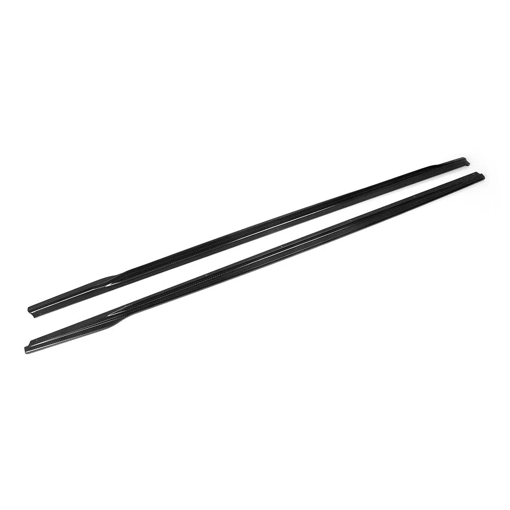 BMW G42 2 Series carbon side skirts laid side by side on white